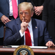 Donald Trump shushing someone